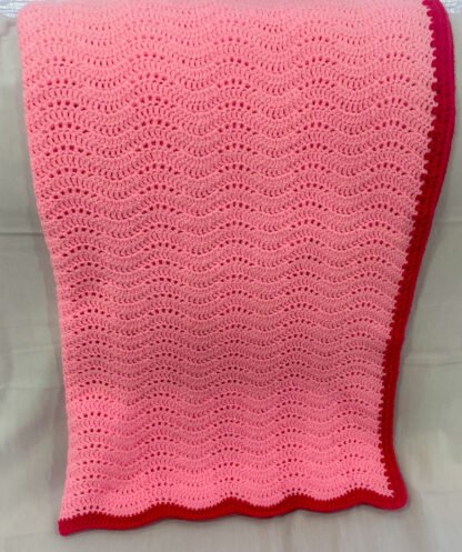 Pink-Raspberry-Feather-and-Fan-Folded-in-Half-draped-over-loveseat-scaled